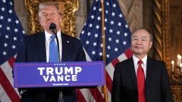 President-elect Donald Trump speaks during a news conference at Mar-a-Lago on Monday, December 16, in Palm Beach, Florida, as SoftBank Group CEO Masayoshi Son listens.