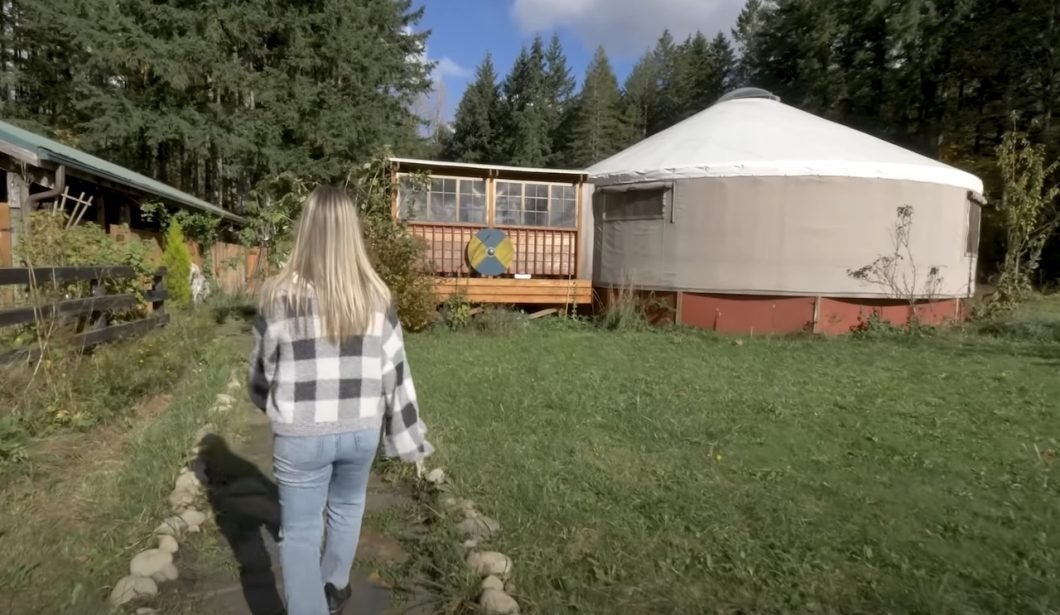 Jenna and the outside of the yurt